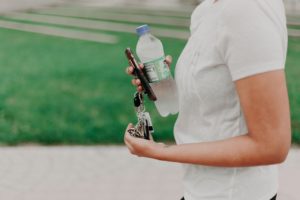 a person holding a water bottle